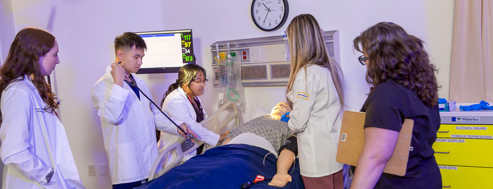 Touro Nevada students practice patient assessment on a simulation manikin at the Michael Tang Regional Center for Clinical Simulation.