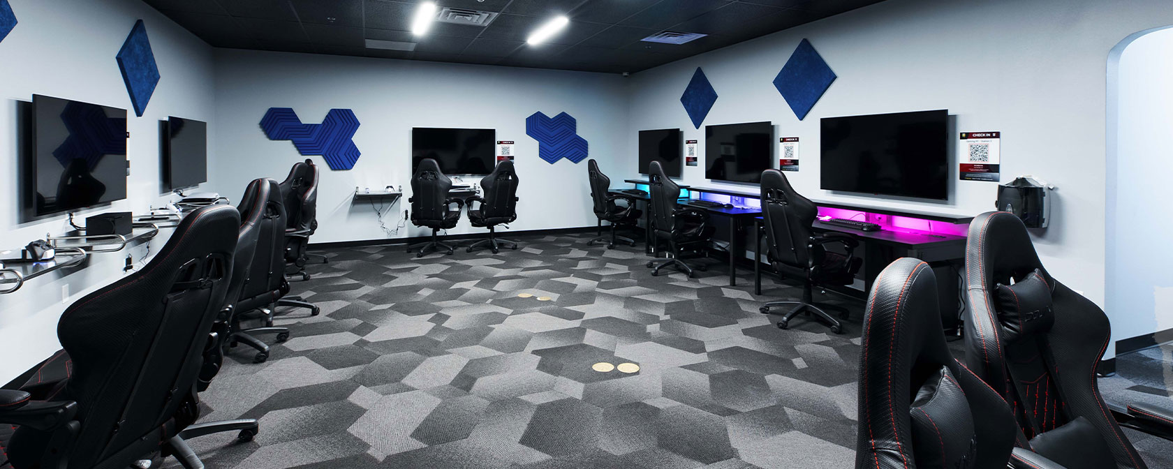 The campus eSports Lounge provides various gaming consoles and PCs for student use.