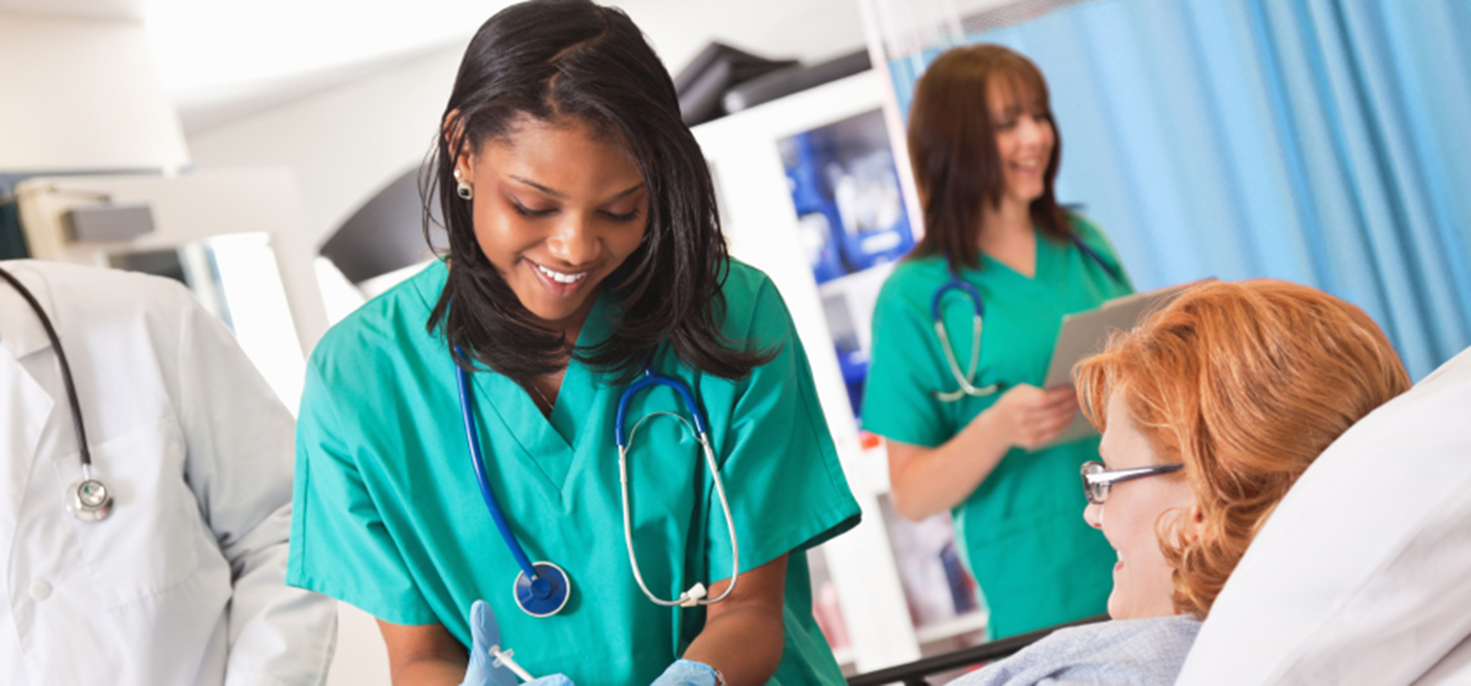 Nurses with patients in a hospital. 